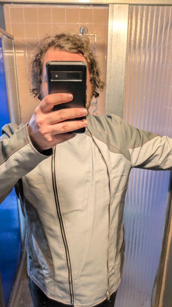 IRL Lu Zanth wearing an Excalibur Jacket