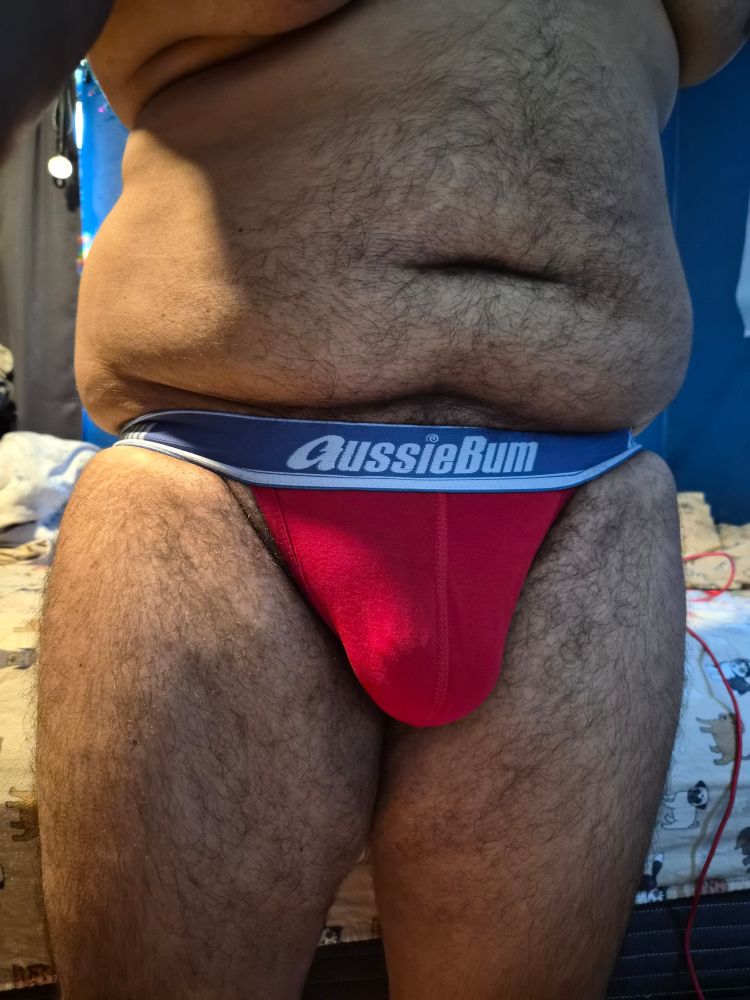 Renba in a red jockstrap from the front.