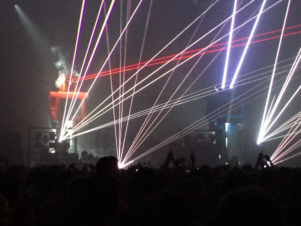 Two giant robots shooting lasers from their eyes while laser shoot from the stage. Yes really.