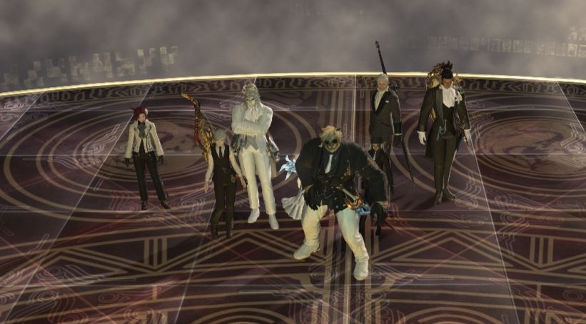Screenshot of a FFXIV party of eight 

Everyone is wearing a different kind of suit, all of them being black except for the middle and far left characters wearing a white one 
