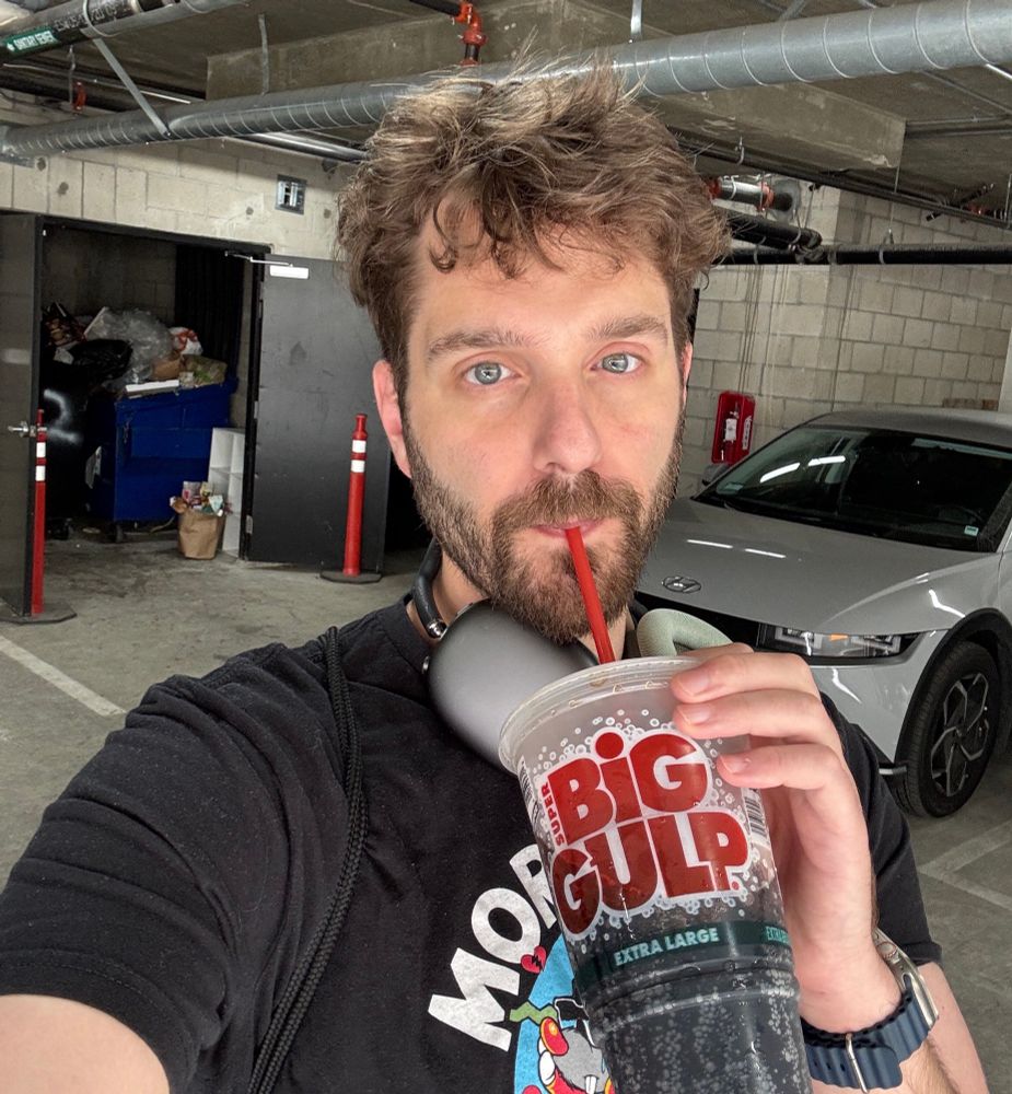 Nick (derogatory) ✨ drinking a Big Gulp in a parking garage 