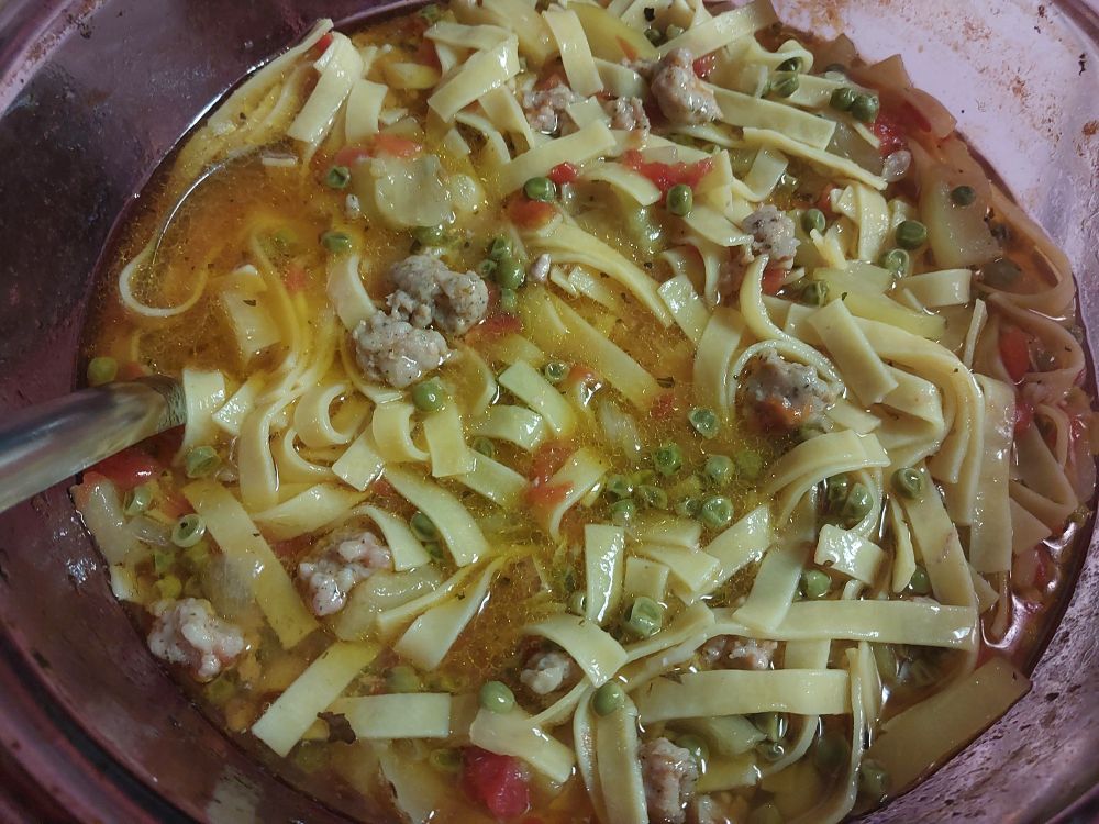 Soup in a purple glass stock pot. Egg noodles, pork, peas, zucchini, tomato, and onion in leftover chicken broth.

Also saaaaalt. Keeping headaches at bay has required having an entire day's worth of salt in every meal and constantly fighting the urge to down half a jug of water in one go. I'm starting to think that calling like eight pharmacies a month might be less obnoxious & it's only been one week of this.