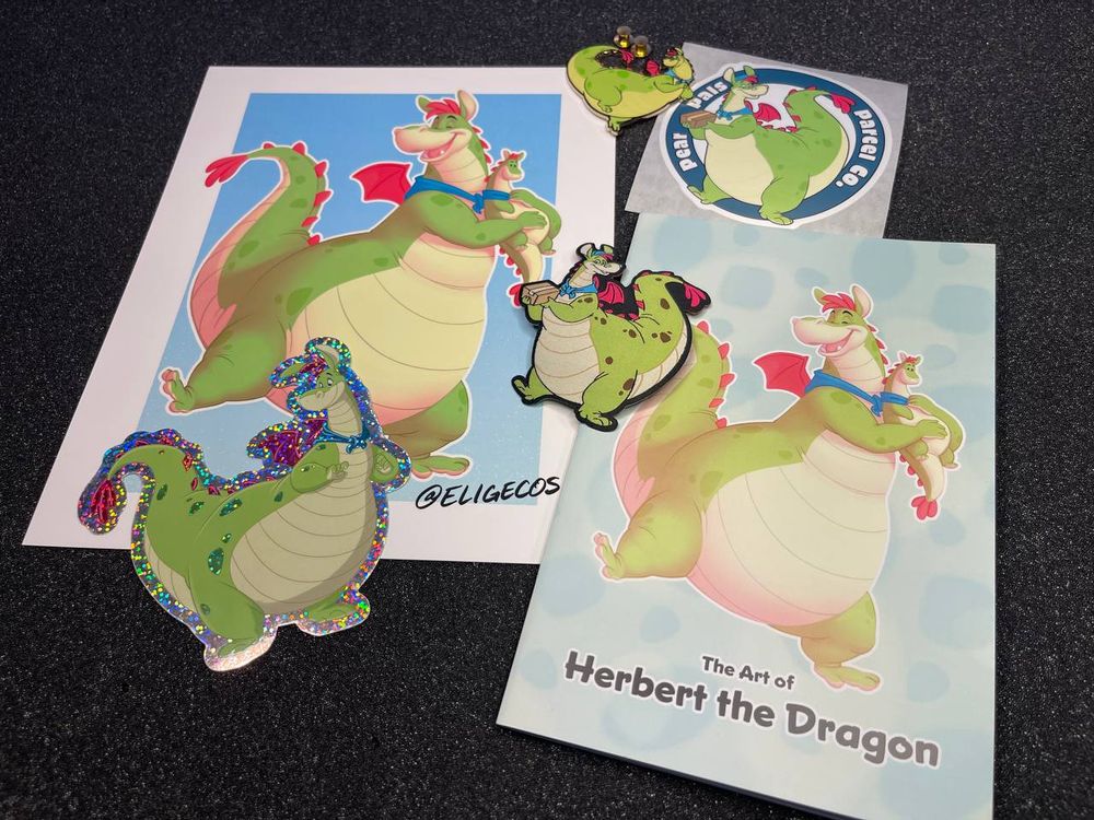 Premium package goodies include plush, 2 unique stickers, one iron-on patch, enamel pin, art print and art booklet.