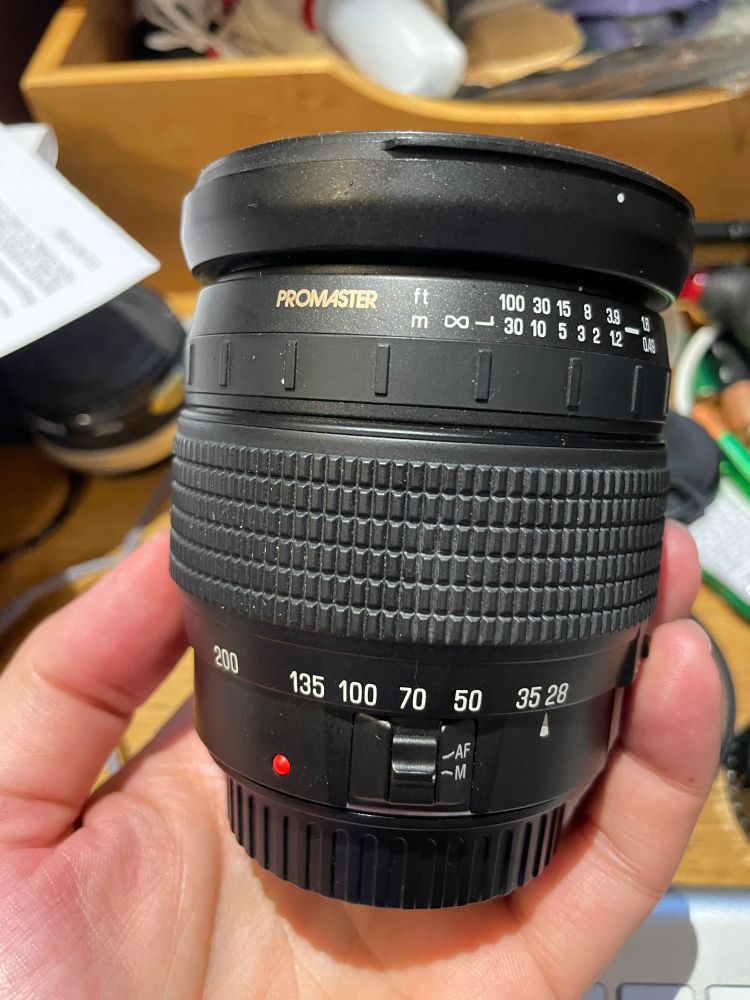Photo of a Promaster LD IF 28-200mm lens. It blows.