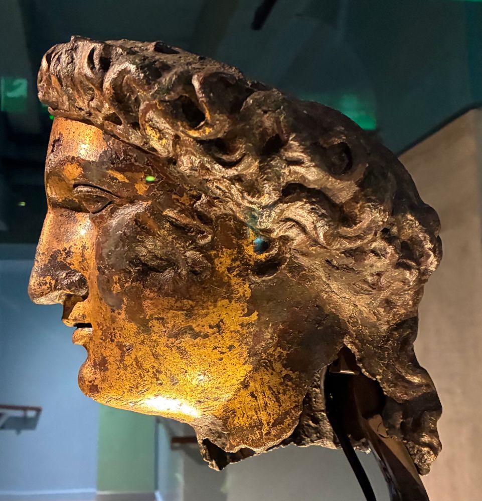 Copper bust of the Roman goddess, Minerva. Side view 