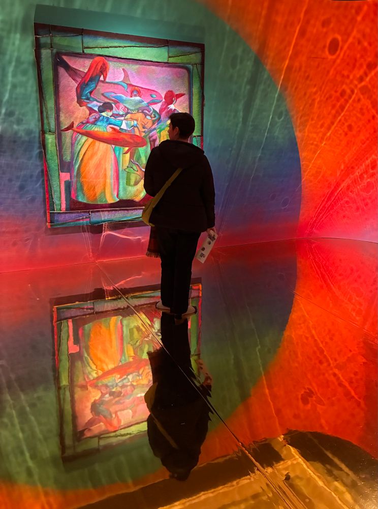 Artwork by finalist Xadie Xa - colourful painting, red and green lighting and golden floor (no shoes allowed)