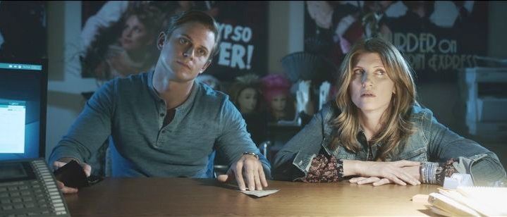 Billy Magnussen as Ryan and Sharon Horgan as Sarah offer a very measly amount of bribe money for a clue in the movie Game Night