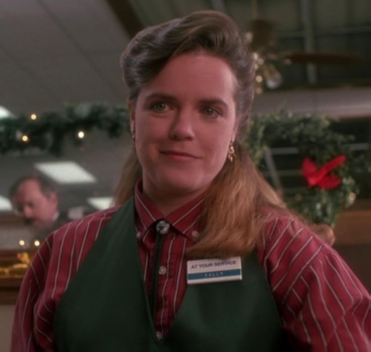 Tracy O'Connor as Sally the grocery store cashier in the movie Home Alone  