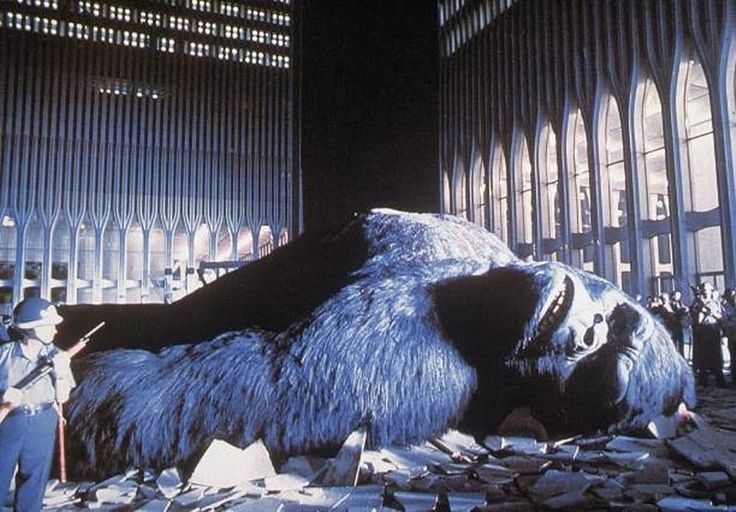 Kong and the twin towers of The World Trade Center in a cgi scene at the end of the 1976 movie King Kong 