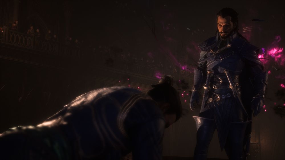 Illario is on the floor looking down while Lucanis stands over him. There is purple energy behind Lucanis as his wings disappear. 