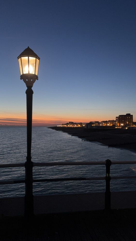 Looking west from Worthing pier just after sunset in winter 