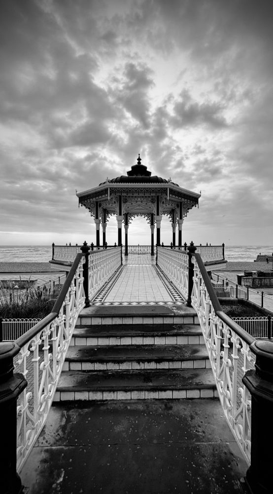 Brighton seafront bandstand in black and white on a stormy day 