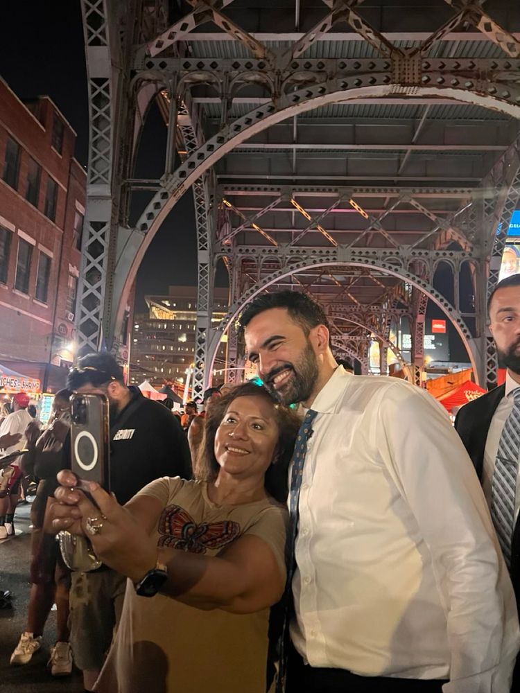 Zohran takes a selfie with a New Yorker