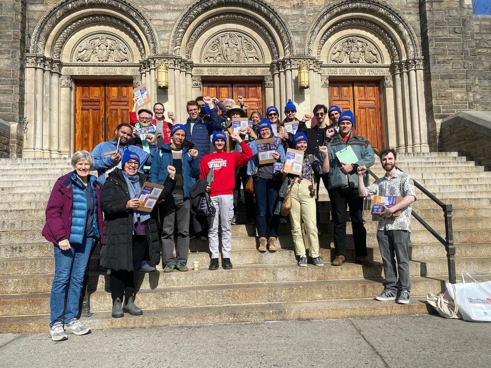 Volunteers standing on Church steps.