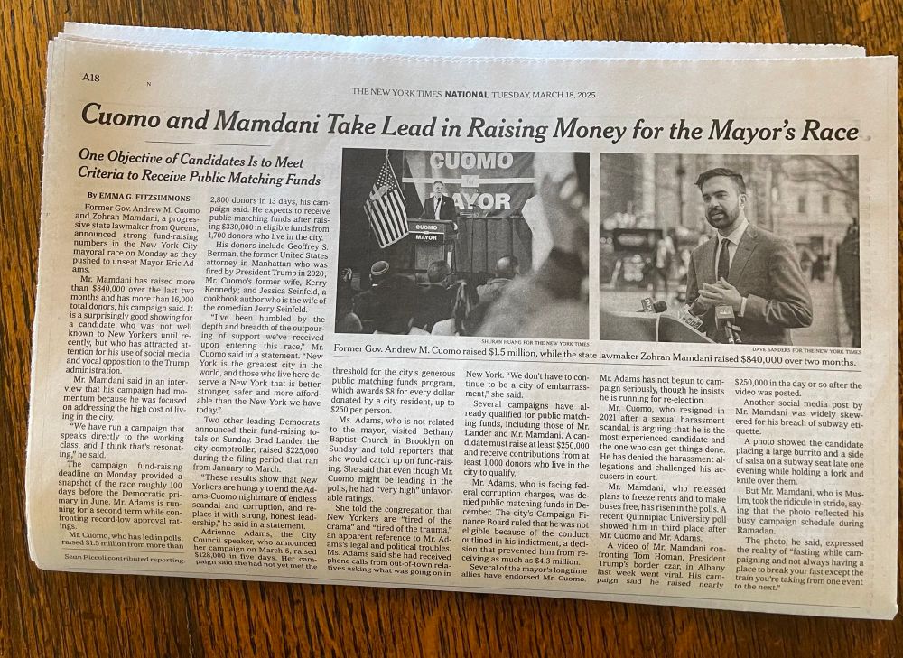 Photo of the print edition of the New York Times opened to an article about Zohran’s big fundraising numbers. 