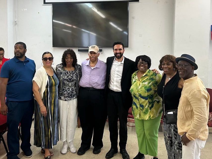 A group photo with Zohran, Leroy Comrie and members of the Democratic club.