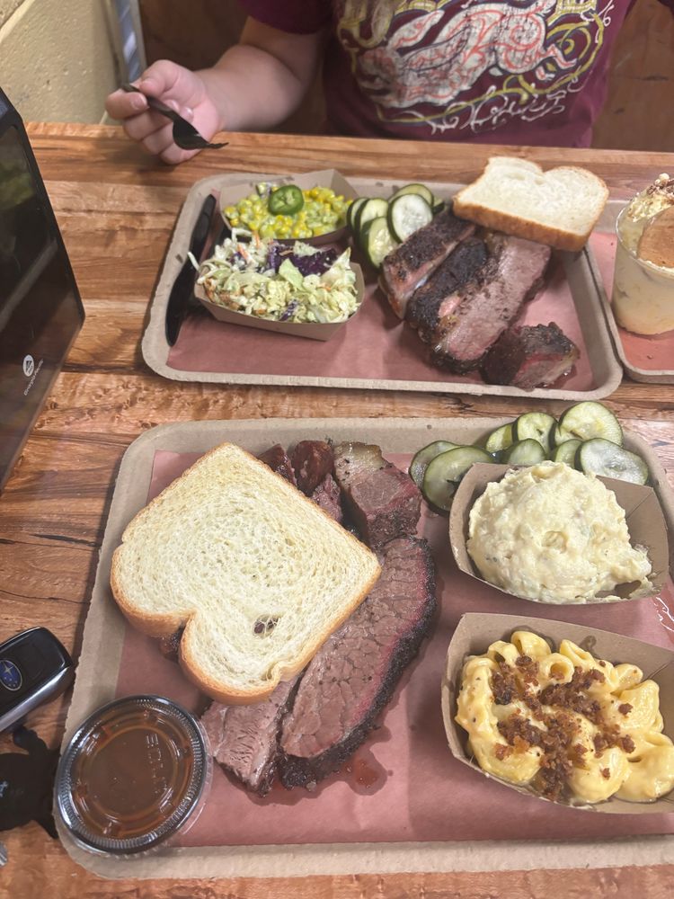 A picture of two plates of very good BBQ