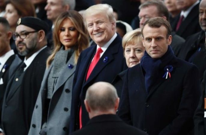 Trump grinning submissively as Putin approaches