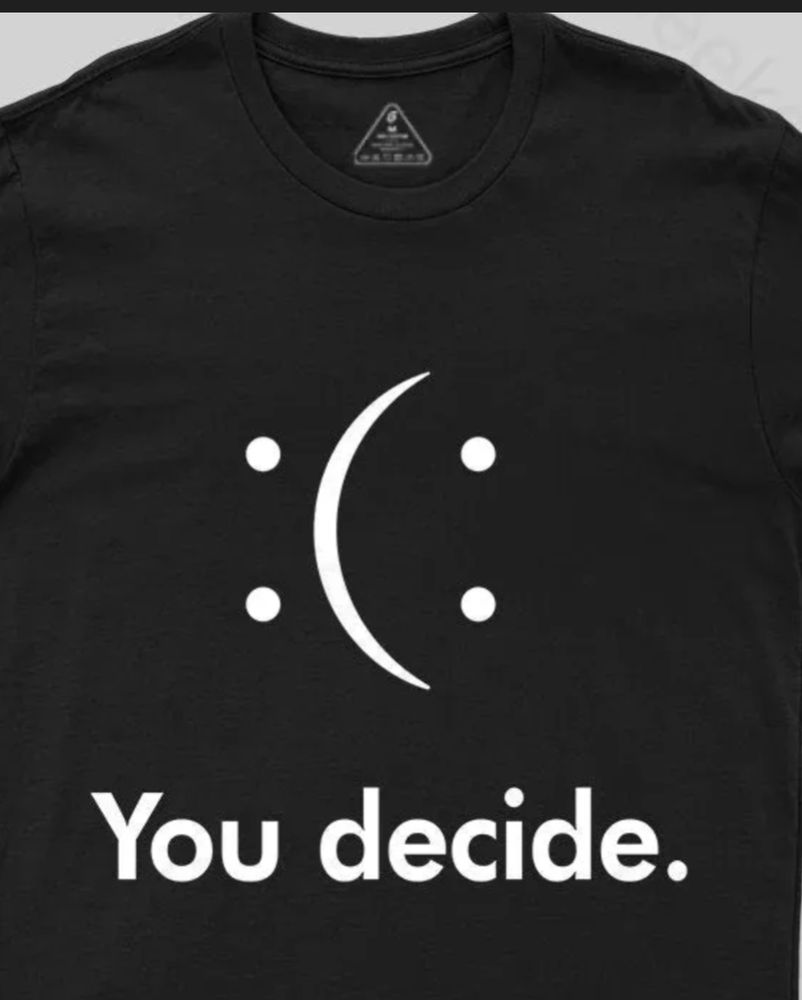 Black T-shirt that says You Decide under 2 colons joined by the open parenthesis to form both the happy & frowning emoticons 