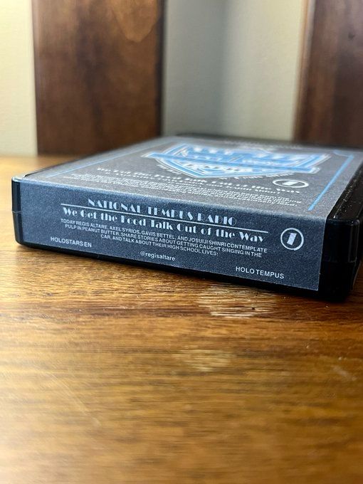 Side view of the 8 track tape, showing the title of National Tempus Radio, “We get the food talk out of the way” 
