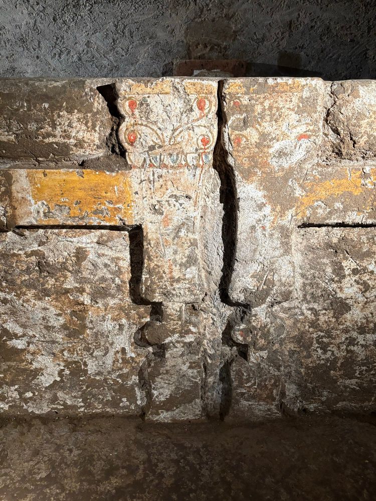 Details of painted “legs” of funerary couches, imitating inlaid ivory of the real thing, and a rich yellow for the crossbeam of the couch