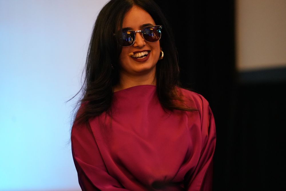 Woman smiling with glasses on