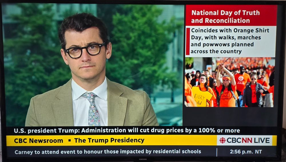 A photo of a TV showing CBC News Network. A reporter, perhaps in Washington somewhere, is looking seriously at the camera. The lower third reads: 

U.S. president Trump: Administration will cut drug prices by a 100% or more
