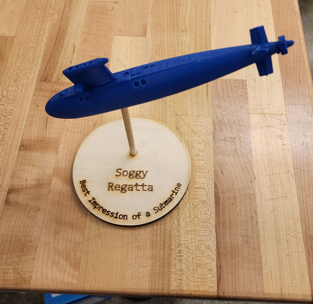 Best Impression of a Submarine trophy - a blue 3d printed submarine on a stick over a base