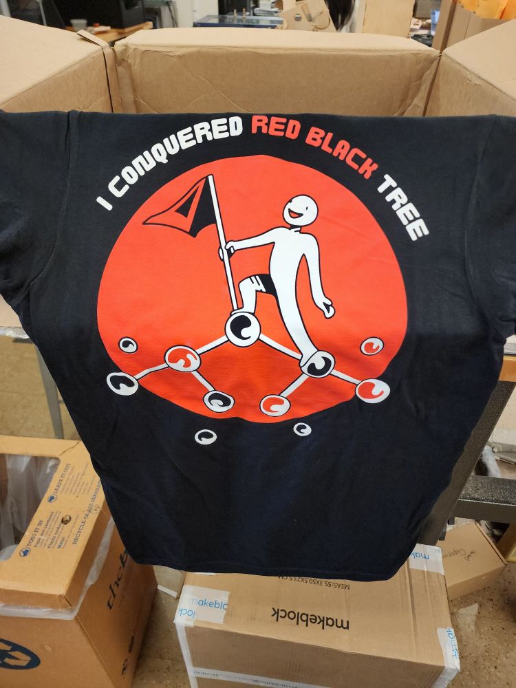 "I conquered red black tree" on the back of a black tshirt