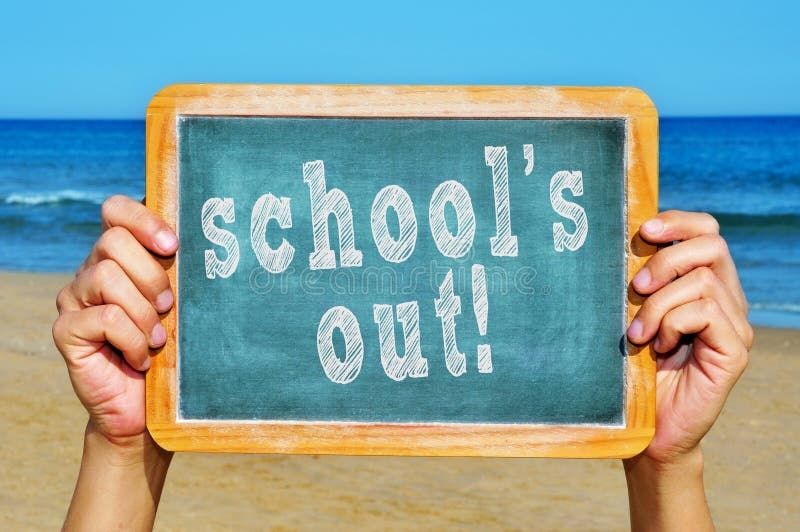 "School's out" written on a small hand held chalkboard