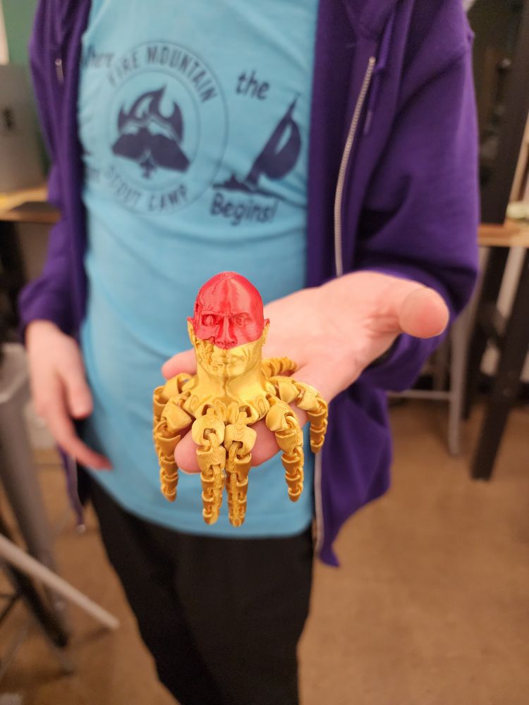 3d printed head-octopus in gold and red