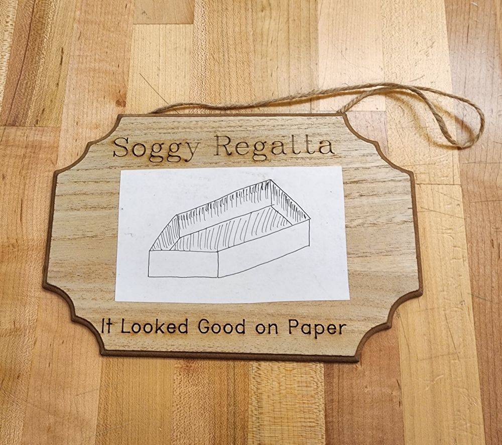 It Looked Good on Paper plaque - a paper sketch on a boat on a fancy board