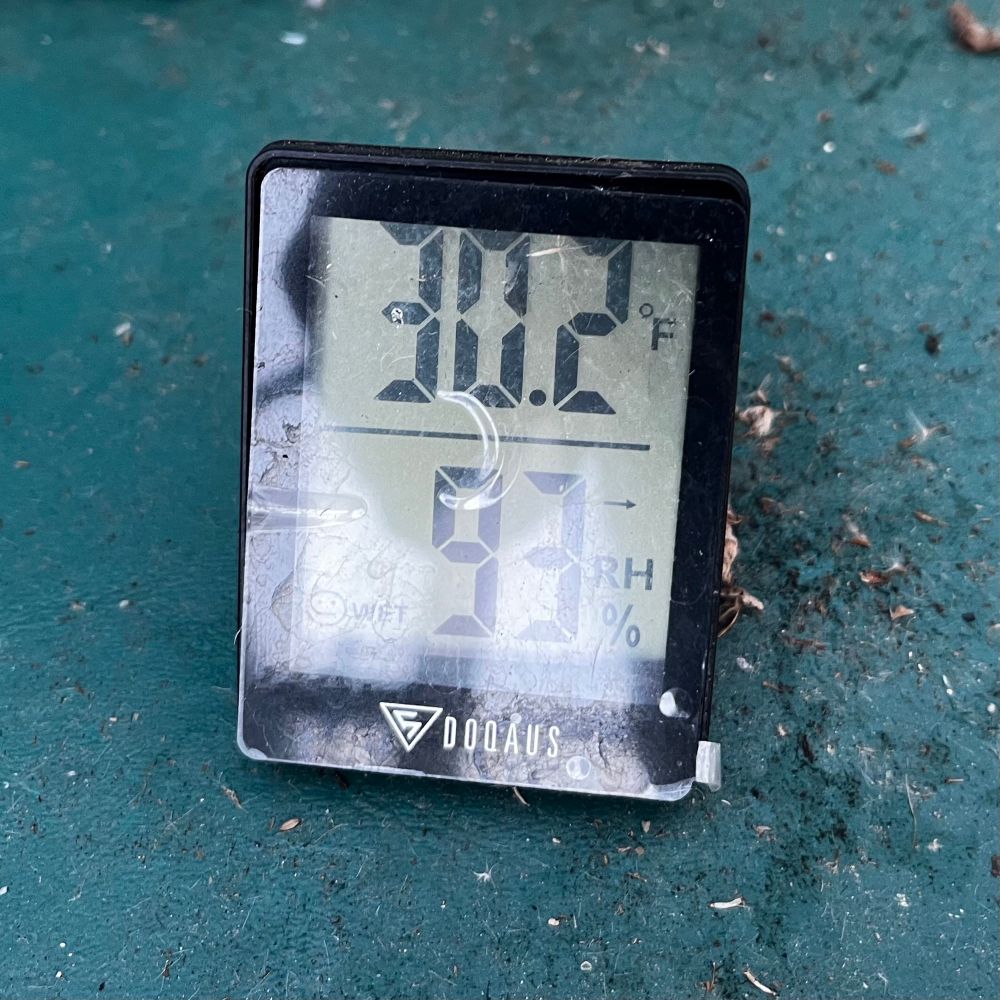 A digital thermometer reading 30.2° F and 93% relative humidity. 