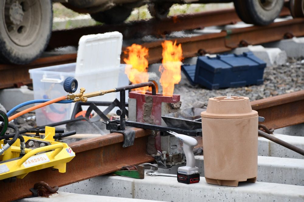 A thermite weld in progress. You can see the flames.