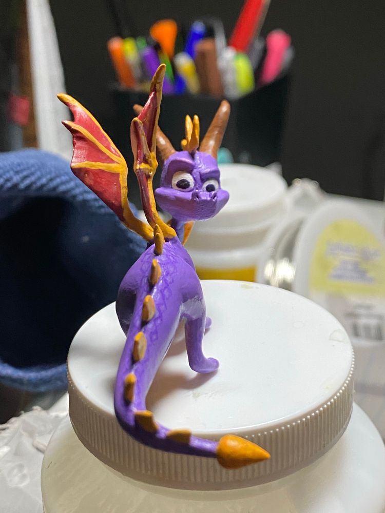 Spyro on a Mod Podge lid for scale.