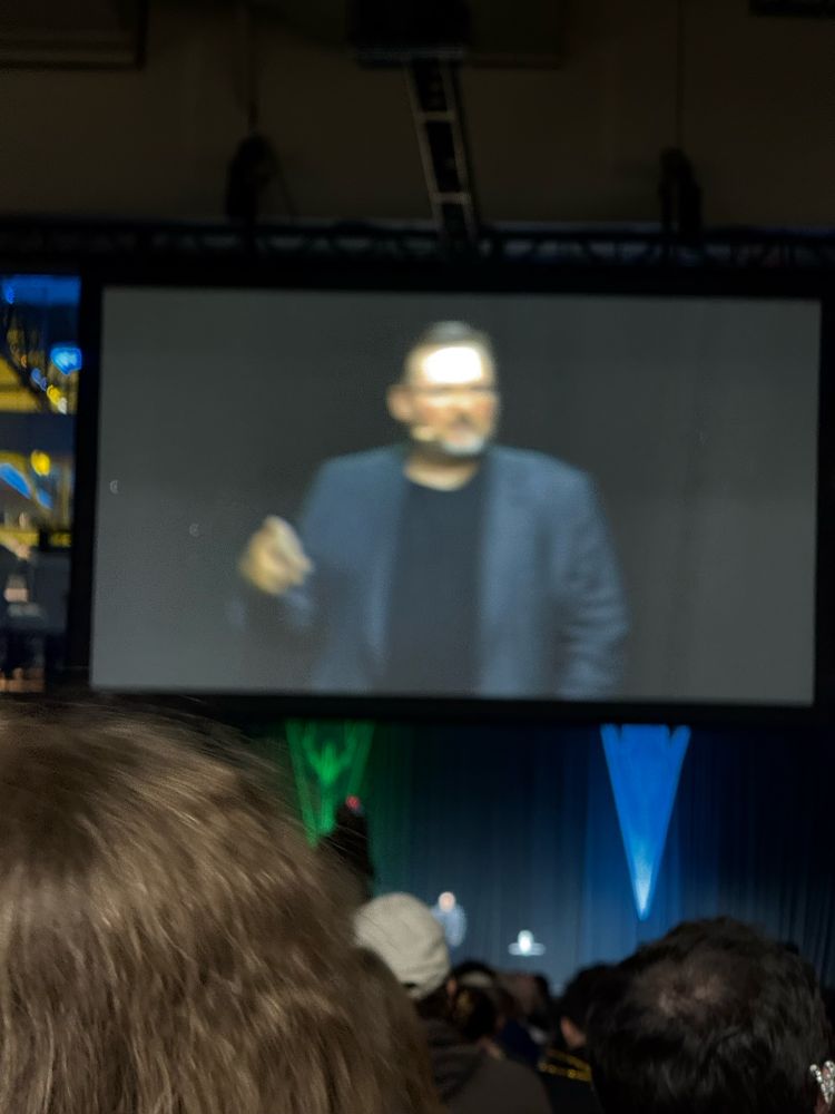View of Brandon Sanderson on a screen