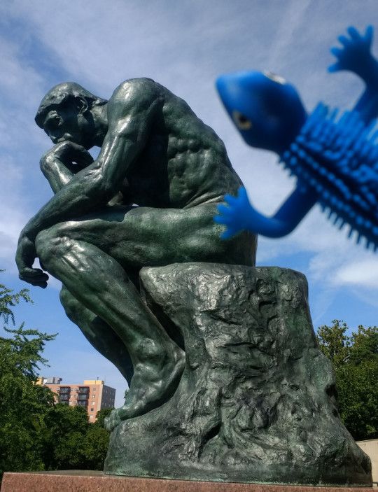 Blue Lizard is positioned in a way that it looks like his left hand is covering the butt of Rodin's famous statue "The Thinker."