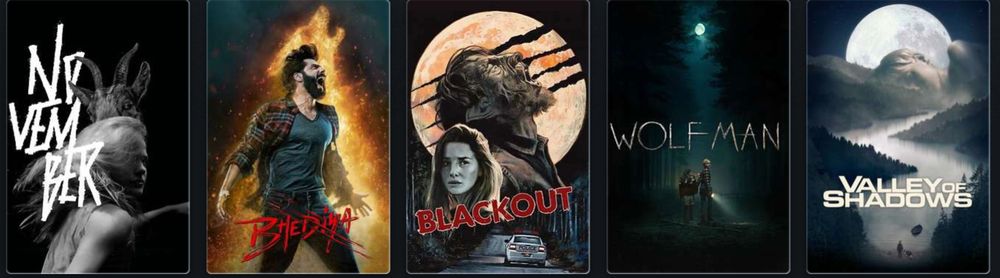 screenshot of five movie posters
1. black and white picture of a person with a goat's head behind the word November is stacked and infront
2. guy in plaid shirt screaming flames in the shape of a wolf are behind the word Bhediya in red is infront
3. illustration of the moon with scratches infront a werewolf and a woman with Blackout written in red
4. photo of a forest with a woman and young girl standing in the middle Wolf Man written above them
5. image of a forest with clouds and a full moon the clouds form the shape of a sleeping child, below is Valley of Shadows written in white