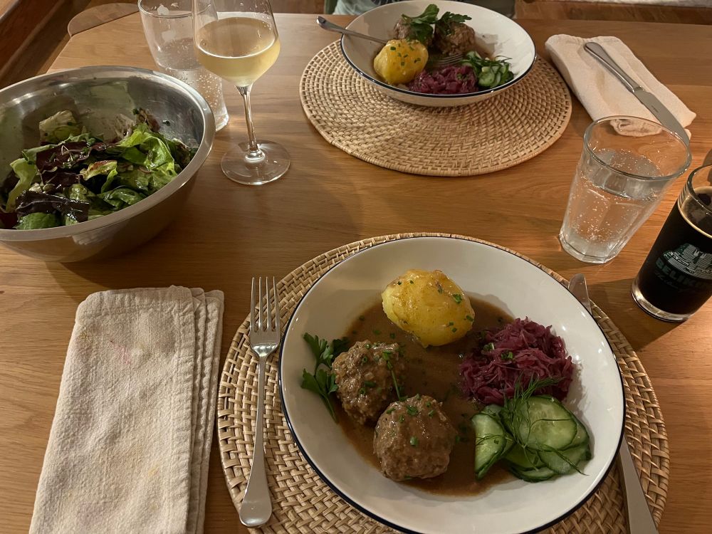 Pork/beef meatballs poached in a roast beef gravy seasoned with juniper berry, bay leaves, and clove. Viennese-style pickles, boiled Yukon gold potatoes, and Rotkohl.

Salad is mix of Boston lettuce, radicchio and sorrel with radish and chive and Styrian pumpkin seed oil dressing with Dijon and apple cider vinegar.