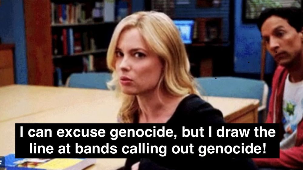 Screenshot from “Community” (TV show). The image shows character Britta Perry (Gillian Jacobs) with Abed Nadir (Danny Pudi) in the background. Britta is talking, the caption reads “I can excuse genocide, but I draw the line at bands calling out genocide.”