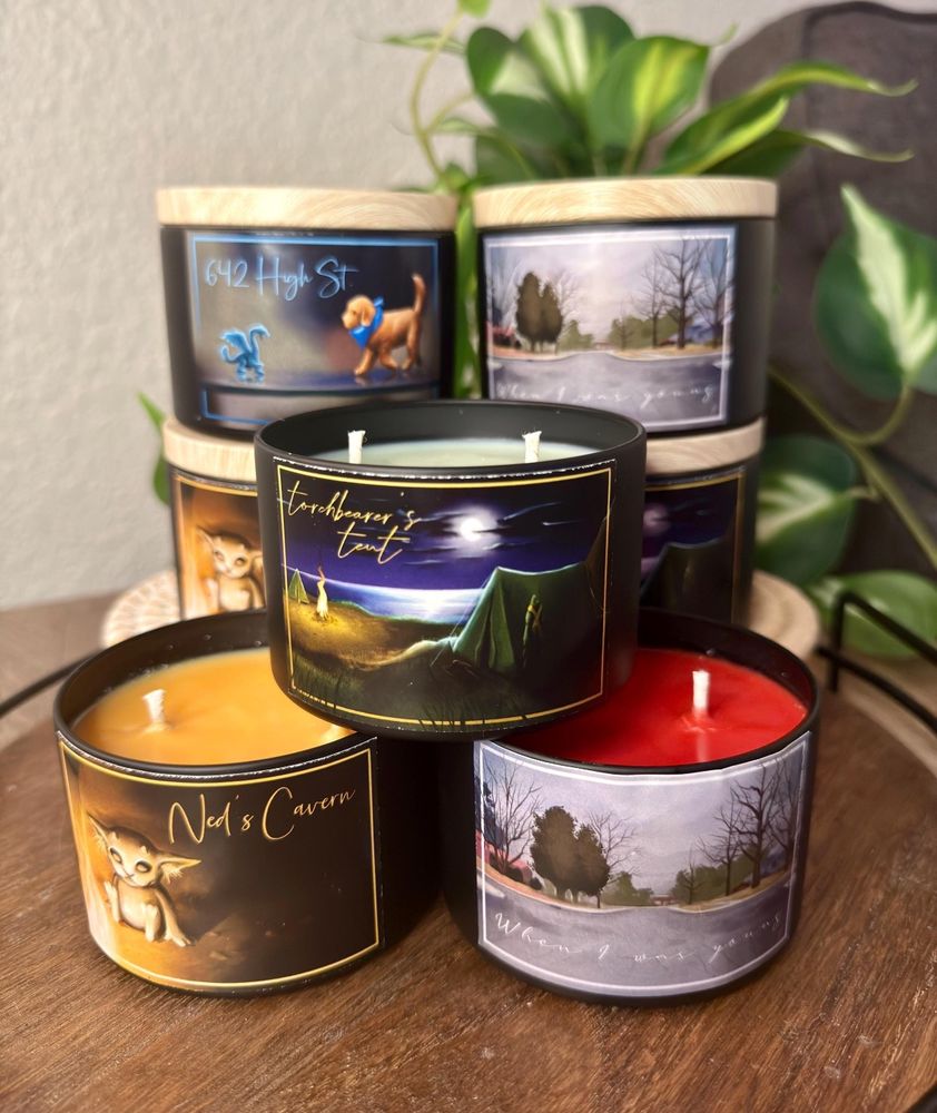 A stack of twenty one pilots themed candles from Megan‘s Etsy store