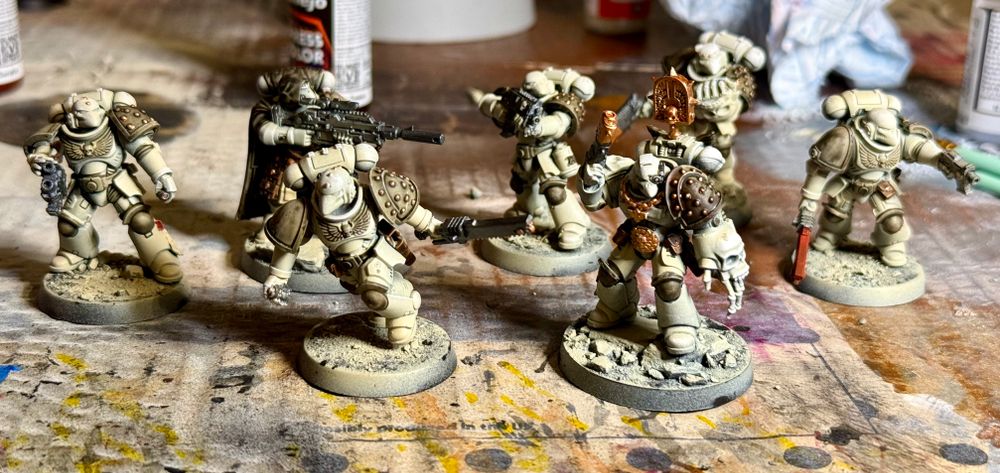 A collection of bone-coloured beaky space marines, painted to a basic standard. Washes to come.