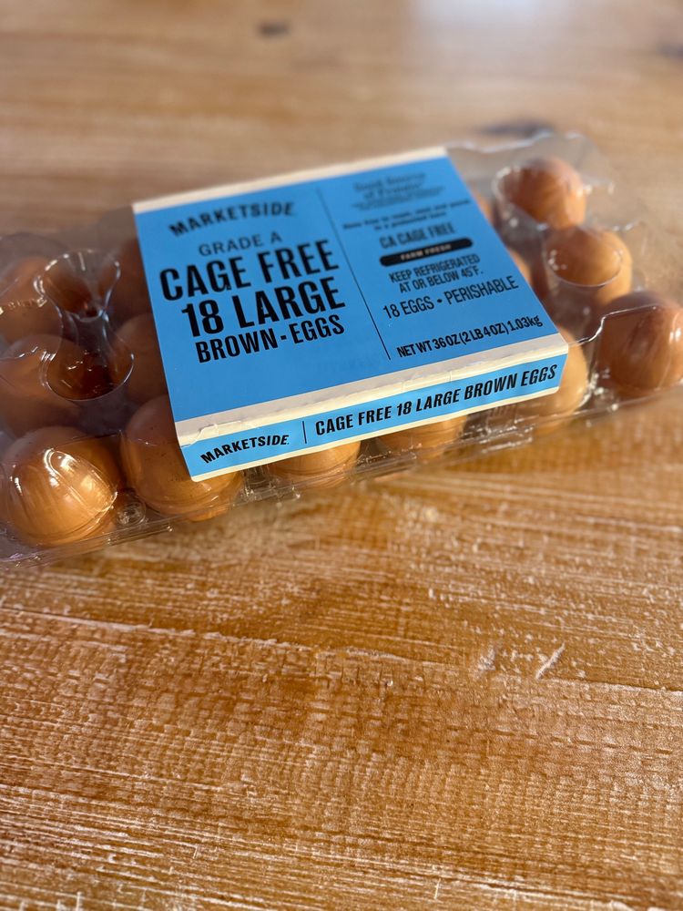 In this image: 18 fresh, large, brown eggs oviposited by (presumably also large) cage free hens. Priceless. 