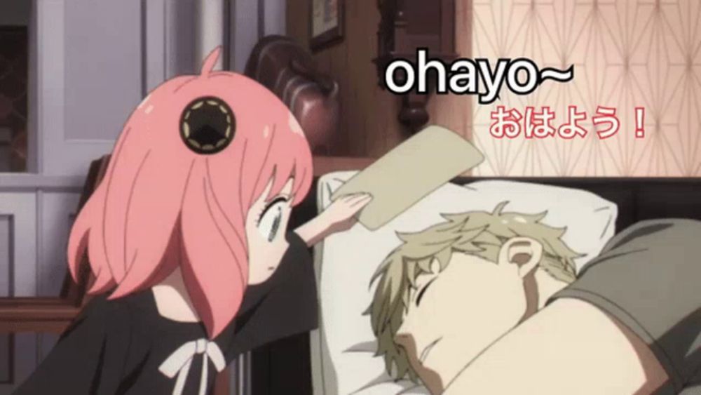 a girl with pink hair is standing next to a man in a bed with the words ohayo ~ written above them