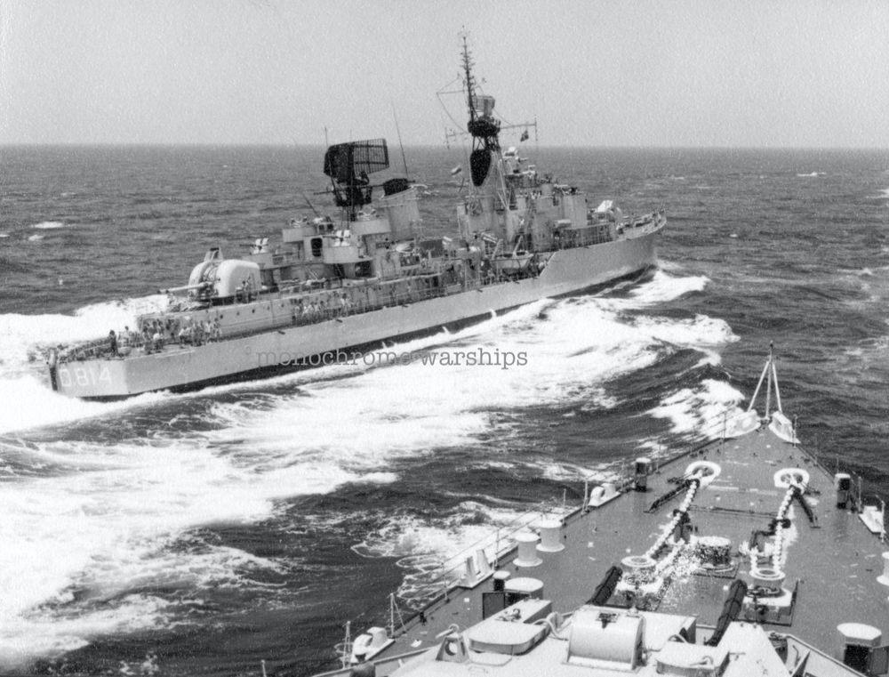 There so goes. Limburg passing by off Tiger's port bow. Even more of the crew are appearing to be enjoying being up on deck. And there's another one of those twin Bofors turrets looking mean. Somehow the angle the photo is taken at makes Tiger's twin 6" guns look tiddly in comparison.