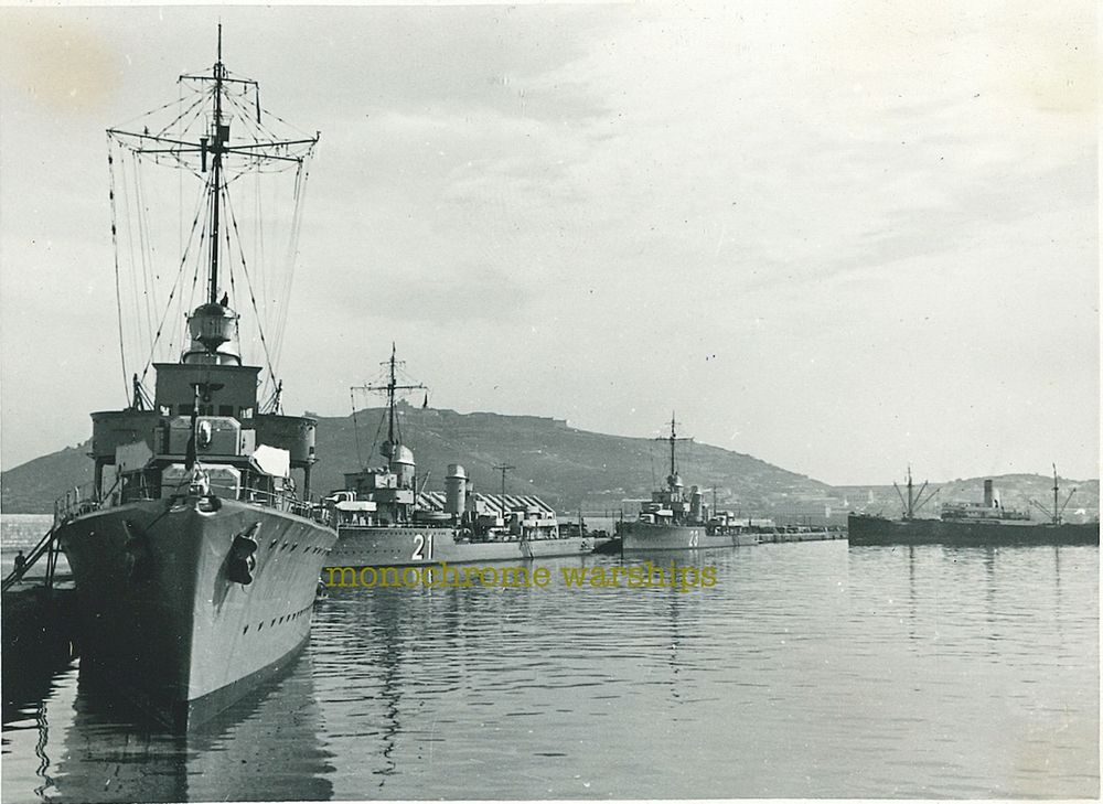 Kreigsmarine destroyers Paul Jakobi (21), Z7 Hermann Schoemann (23) & possibly Z6 Theodor Riedel alongside a quay. Background looks like it may be Ceuta, which the 2nd Destroyer Division visited in 1938.
