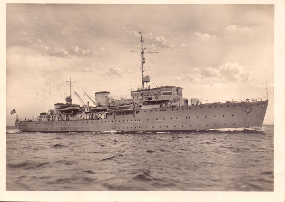 A starboard side profile view of U-boat tender Saar, making progress in relatively calm seas.