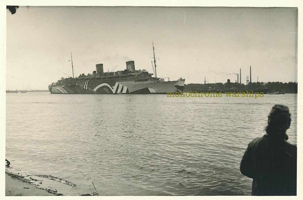 A WW2 photo of a liner with dazzle camouflage, a paint scheme guaranteed to brighten up the dullest looking boat.