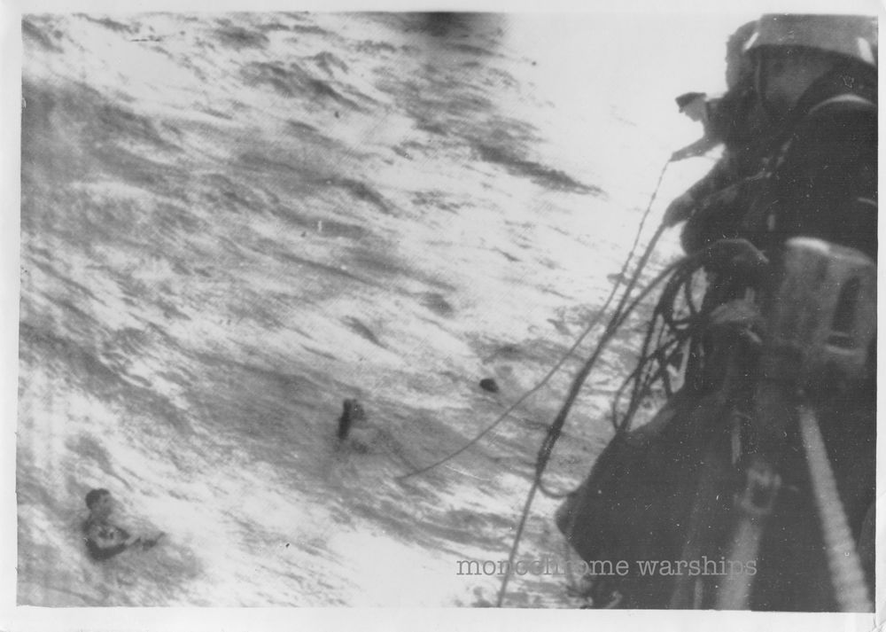 British sailors being thrown ropes from a presumably Kriegsmarine vessel. The photo is quite grainy and quite dramatic.
