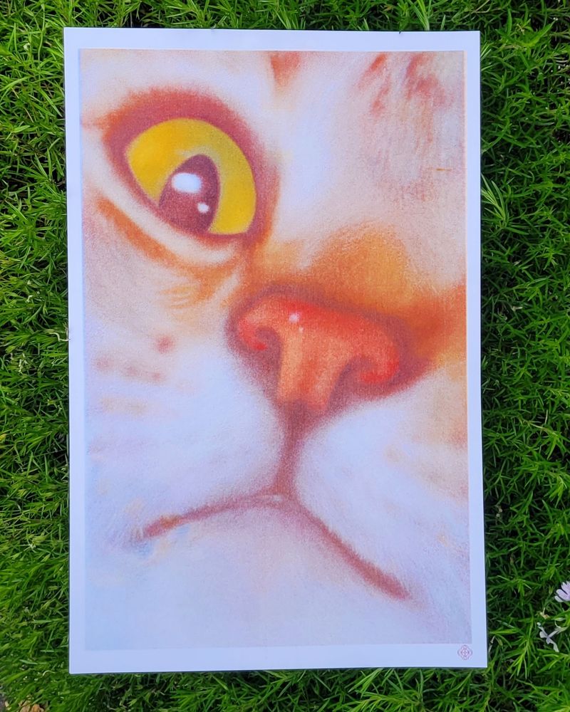 A risograph print of an extreme closeup of a brown tabby cat's face with only one eye visible. yes there is some weird splotchiness in my defense the blue drum was really acting up!!
